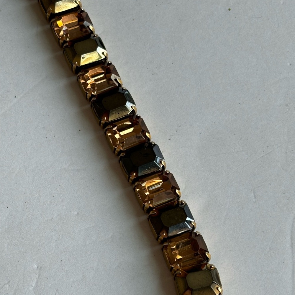 Copper color tennis bracelet/ large rhinestones / measures 7 in length/ …